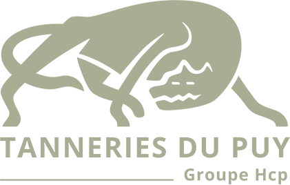 Logo des Tanneries du Puy avec une représentation stylisée d’un animal, accompagné des mentions “TANNERIES DU PUY” et “Groupe Hcp”.